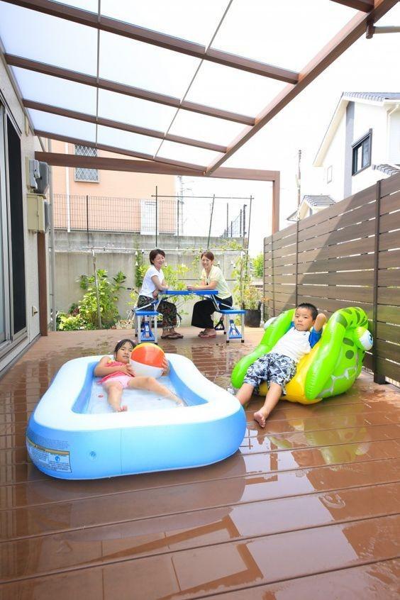 若你住一层这个夏天试试遮阳棚+防腐木休闲地台比种花好看(图6)